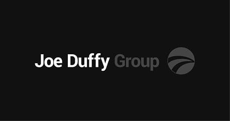 The Joe Duffy Group logo: the words “Joe Duffy” in white and “Group” in grey, beside a grey circular emblem, on black.