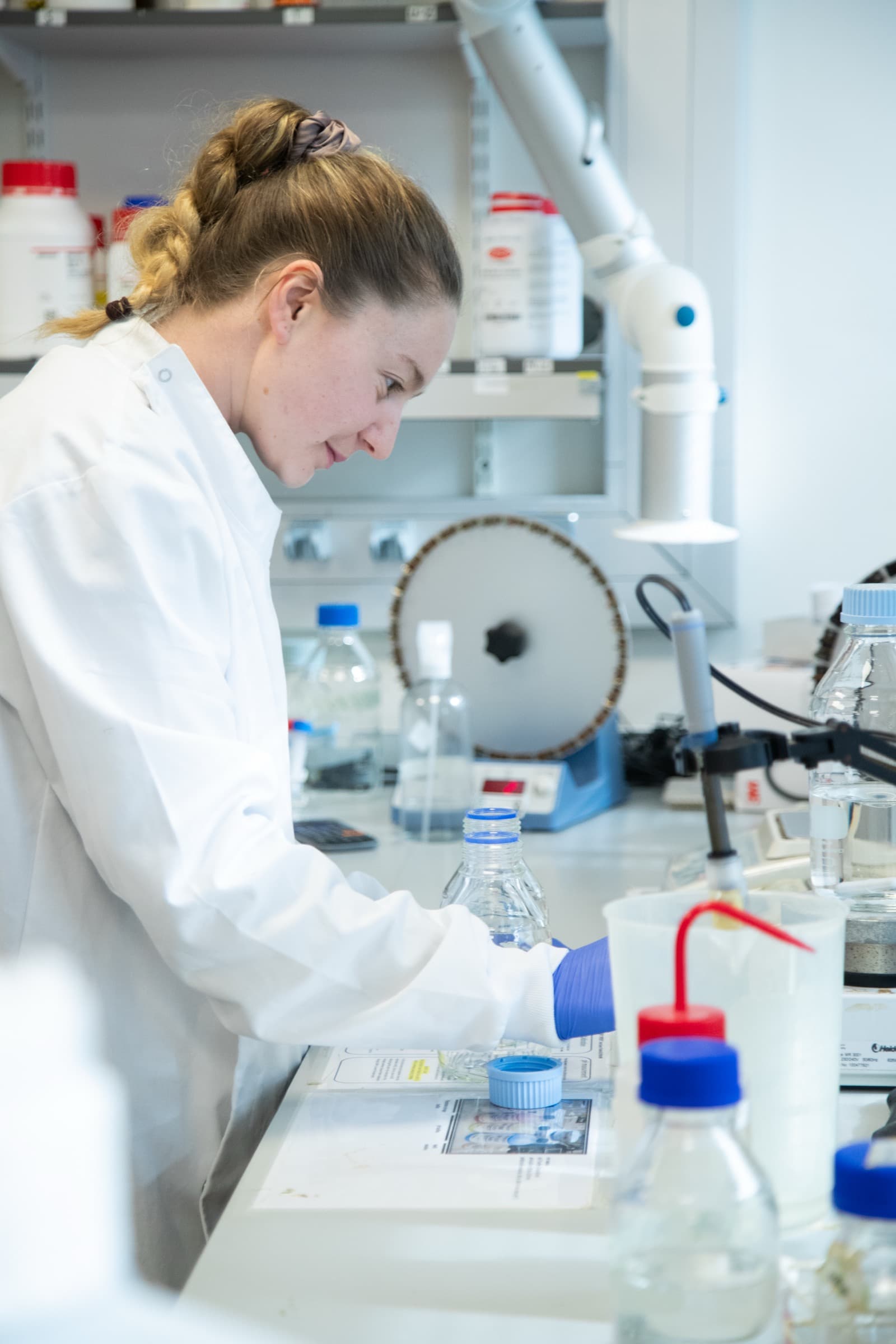A Breast Cancer Ireland researcher working at a lab bench